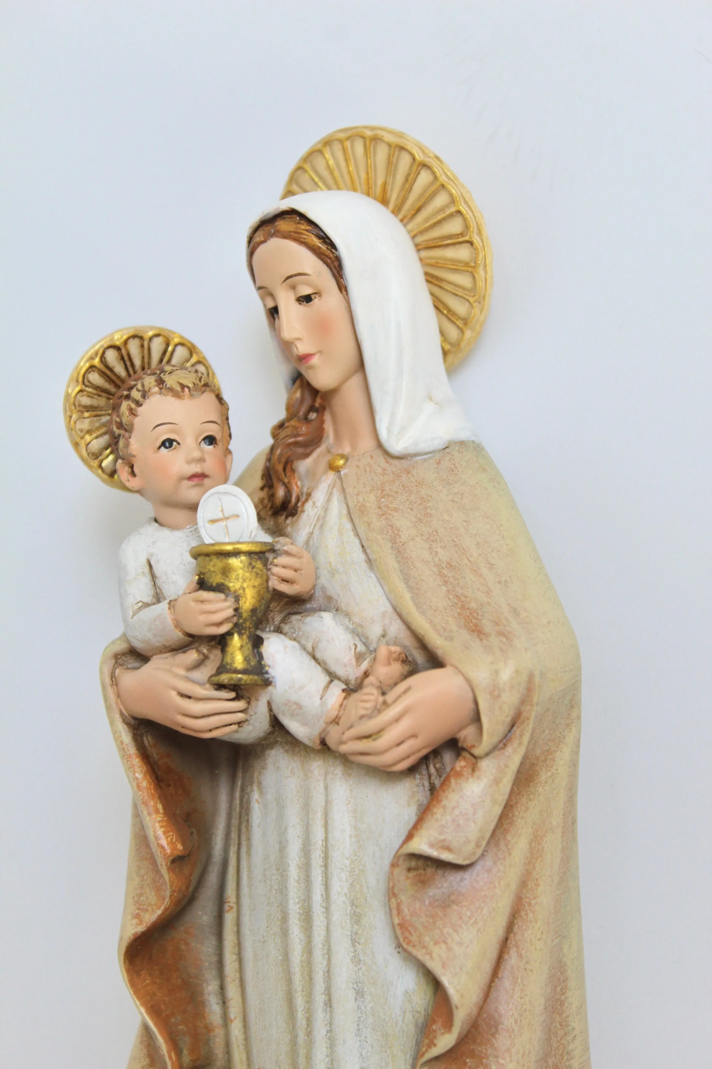 Virgin Mary Eucharist Statue