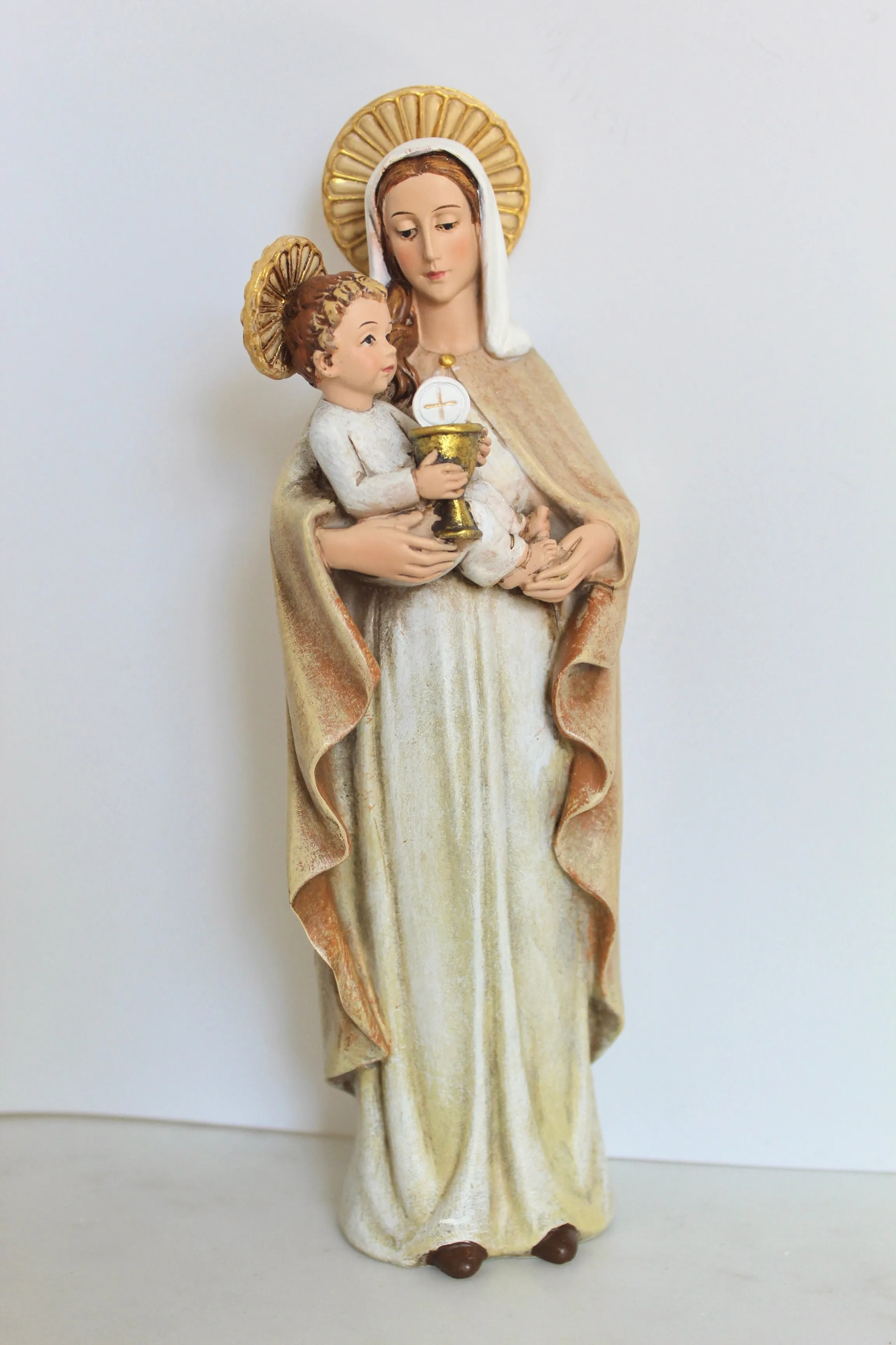 Virgin Mary Eucharist Statue