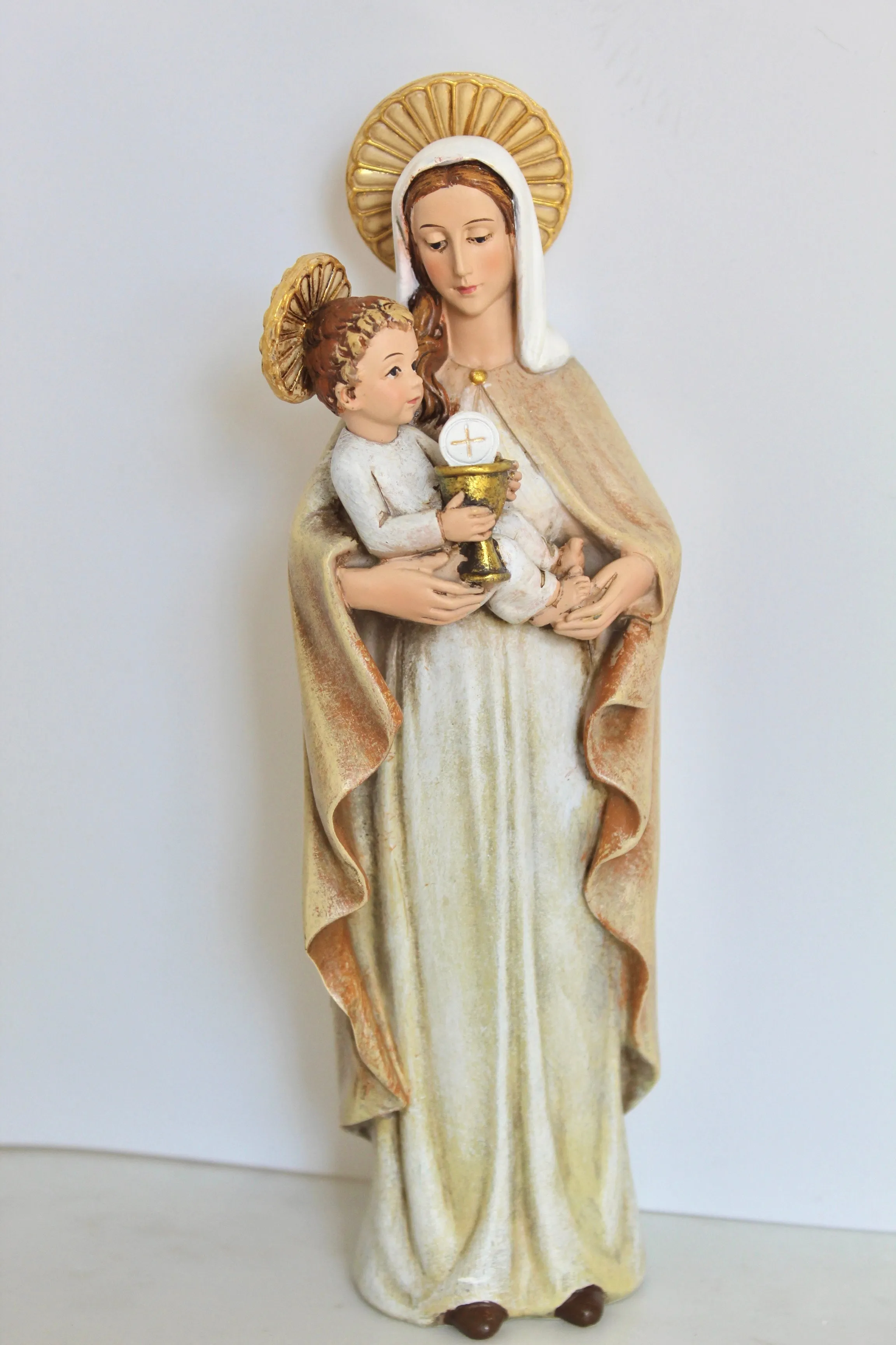 Virgin Mary Eucharist Statue