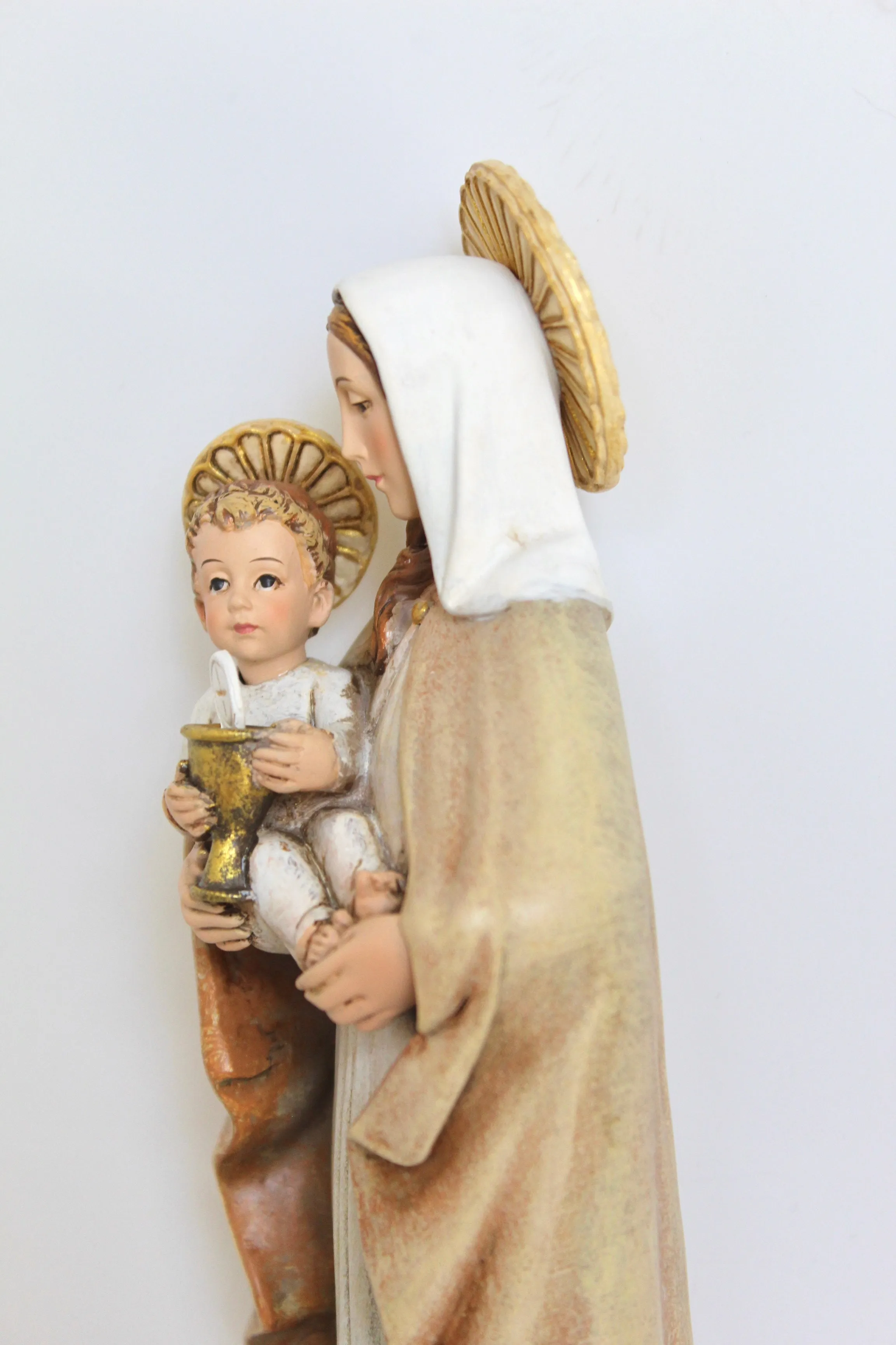 Virgin Mary Eucharist Statue