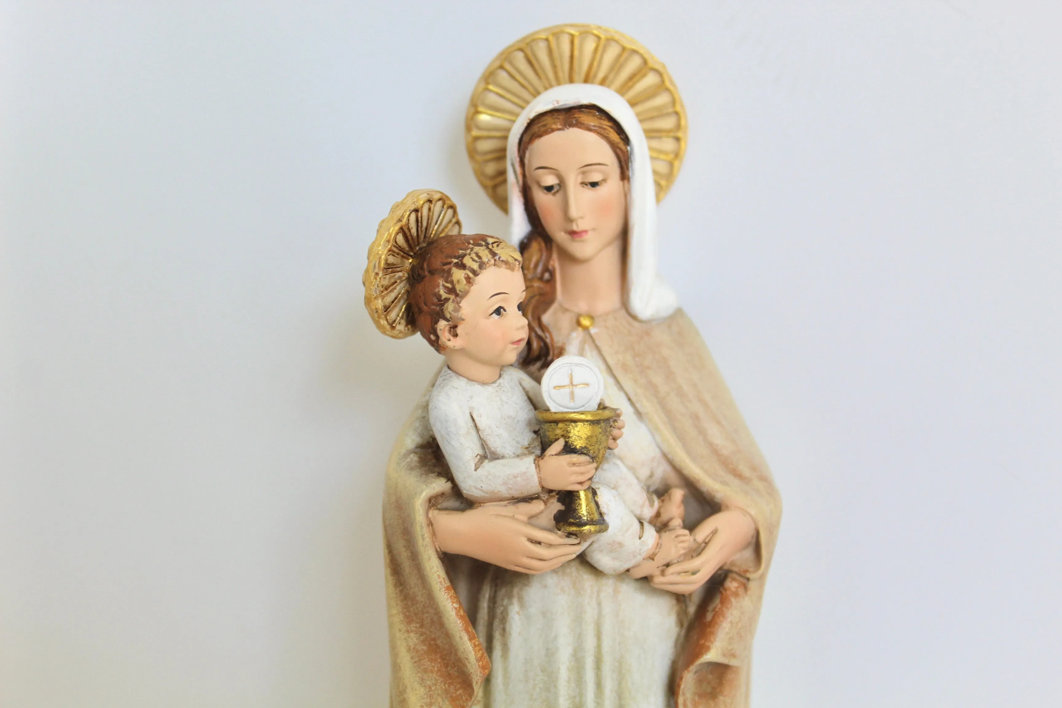 Virgin Mary Eucharist Statue