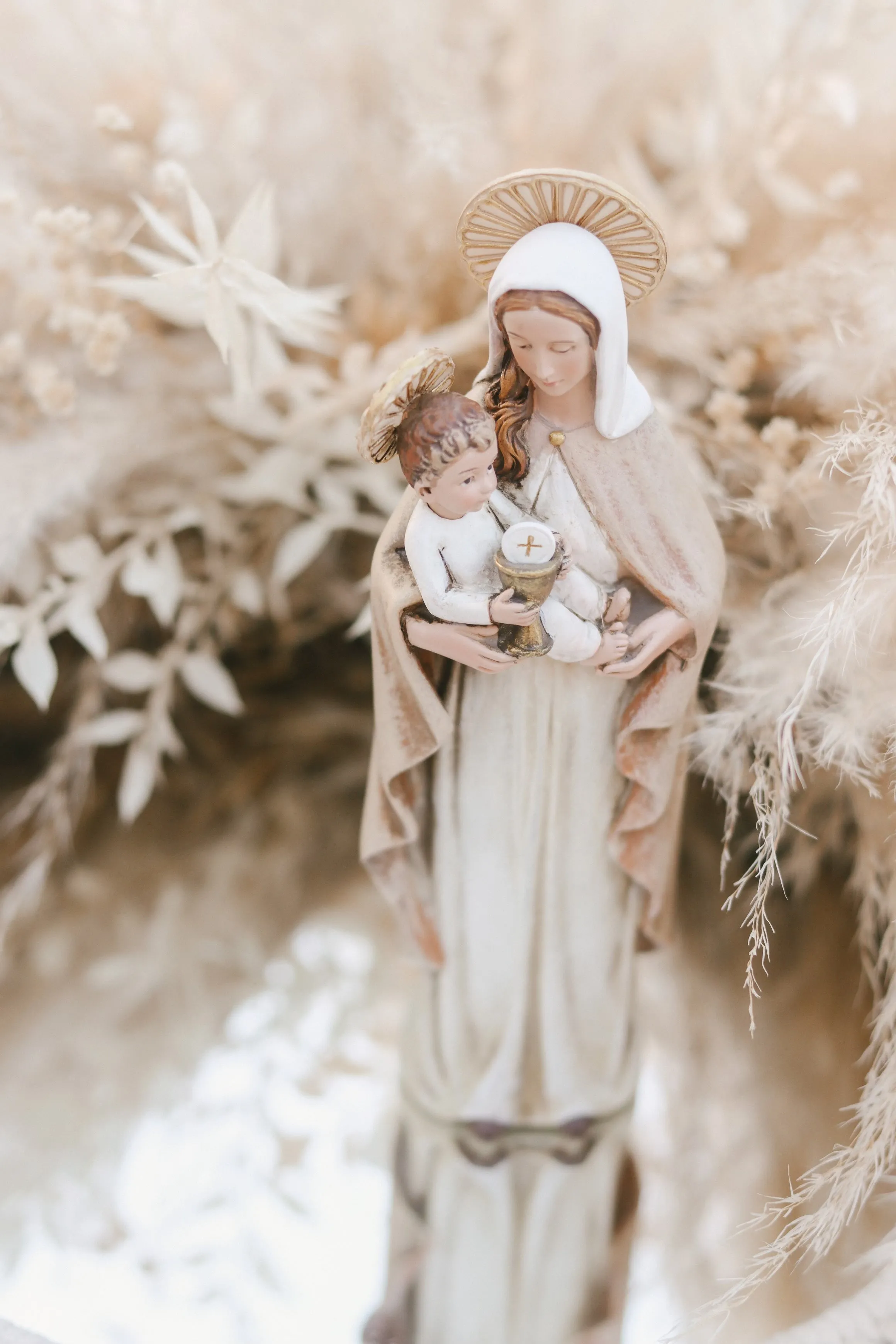 Virgin Mary Eucharist Statue